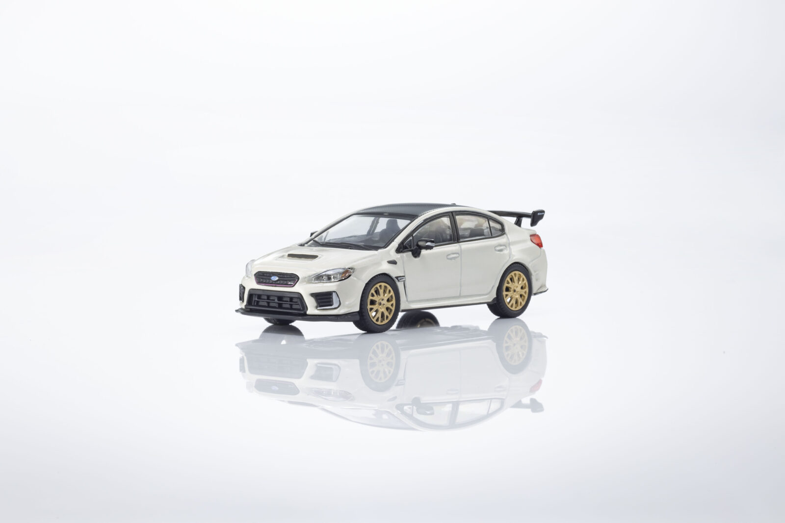 Subaru S209 + Libro DS Modellismo Subaru S209 Libro scala 1:64 Kyosho
